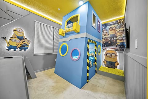 Step into a whimsical playhouse filled with fun, bright blue walls, and cheerful yellow accents. The colorful Minion decor sparks creativity and imagination, making every visit a delightful adventure for our guests.