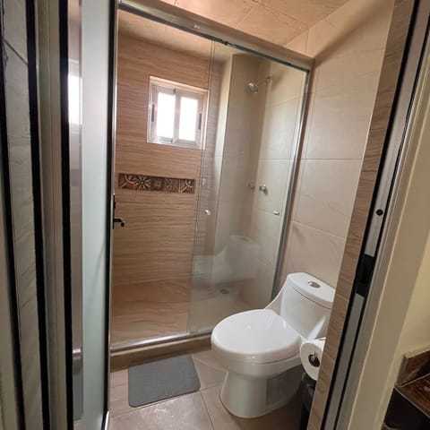 Deluxe Double Room | Bathroom | Shower, towels, soap, shampoo