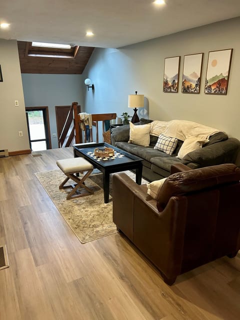 One of 2 living room spaces. Perfect for game night.