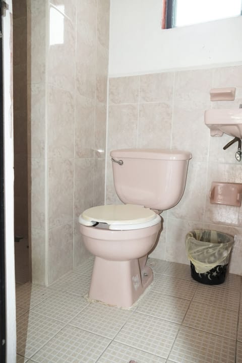 Deluxe Quadruple Room, Balcony, City View | Bathroom | Shower, towels, soap, shampoo