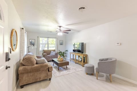 Inviting living room with smart TV and plenty of comfort.