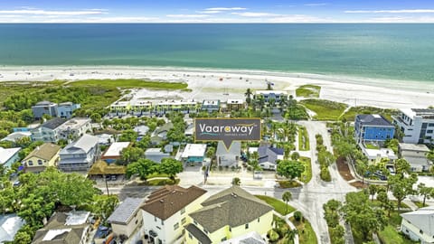 A Bird's Eye View Showing CJs on Siesta's Location next to the Beach