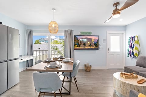 The Dining and Living Areas highlighted by natural light.