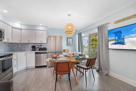 Prepare meals with a view, the vibrant greenery just beyond the glass inviting you to breathe deeply and unwind.