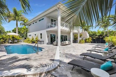 Private Lush Greenery Huge backyard and patio with loungers, dining and seating area