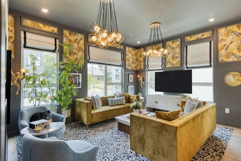 Stylish living room with natural light and mid-century decor.