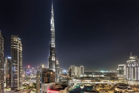 Stunning night skyline featuring the illuminated Burj Khalifa in Dubai.