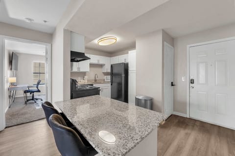 Open dining area w/ stylish chairs & plenty of natural light.