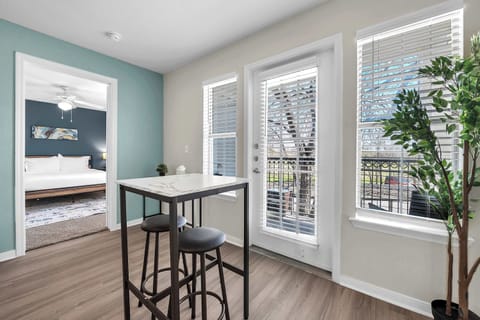 Dining nook set beside the living space, perfect for shared meals or morning coffee.