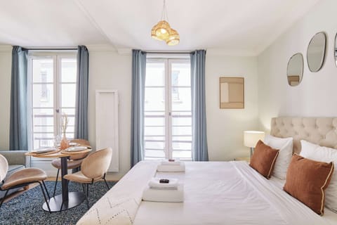 Apartment | Laptop workspace, iron/ironing board, bed sheets