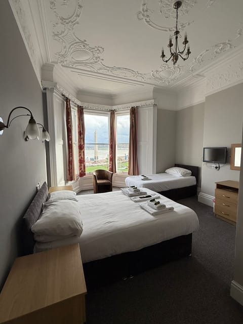 Family Room, Sea View | Iron/ironing board, free WiFi, bed sheets