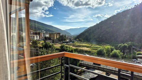 Deluxe Twin Room, Balcony, City View | In-room safe, desk, laptop workspace, blackout drapes