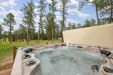 Unwind after a day of exploring with a relaxing soak in the private hot tub.