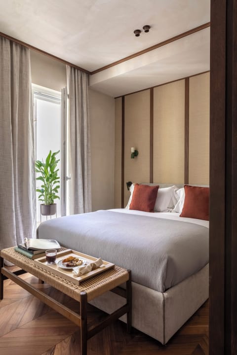 Suite, Balcony | Minibar, in-room safe, desk, laptop workspace