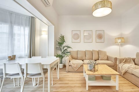 Deluxe Apartment, 4 Bedrooms, Balcony | Living area | Flat-screen TV