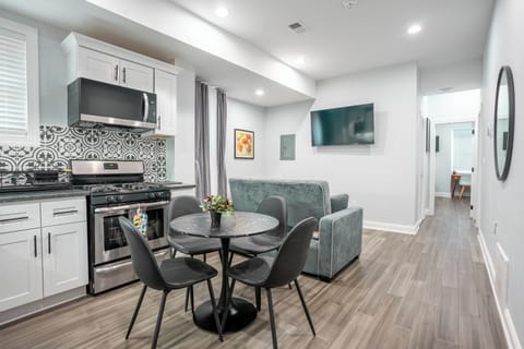 The Loft at Cedar Park: Open concept living and dining area with a full kitchen.