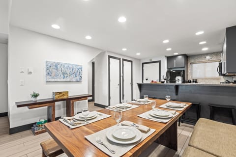 Snow Flower 126 has a dining area with seating for 8 guests.