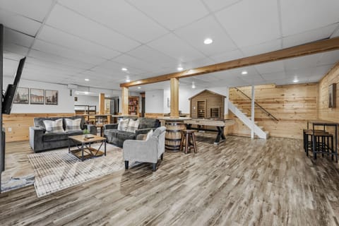 Spacious lower level includes fun for all - games, pool table, kid cabin and mor