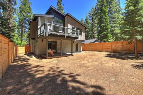 Backyard view showing 2 decks