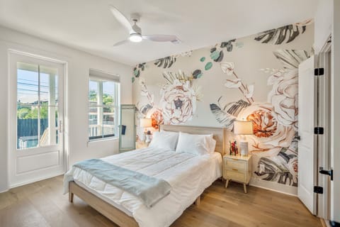 Beautiful coastal vibe complete with warm gold accents and floral coziness!
