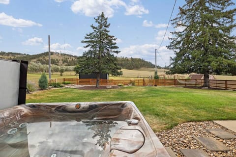Soak in the warm bubbles as you gaze up at the trees swaying gently overhead, or lounge in the hammock with a book and let the fresh breeze wash over you.