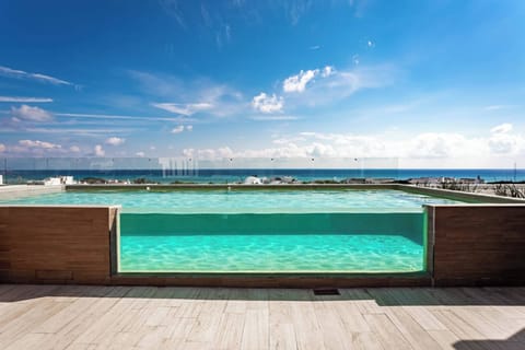 Apartment, 1 Bedroom, Balcony, Ocean View | Pool | Outdoor pool