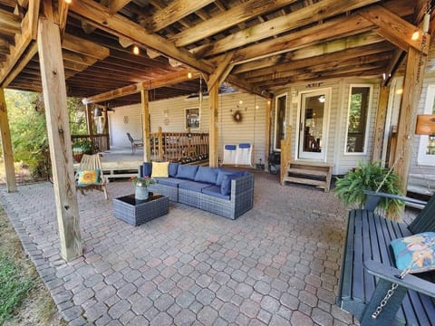 Large two-tiered covered patio so you can enjoy the outdoors in any kind of weather. You won't want to leave this peaceful quiet space.