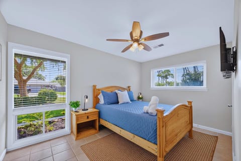Bedroom: Bright room with a plush bed, sunny views, and modern decor for ultimate relaxation!