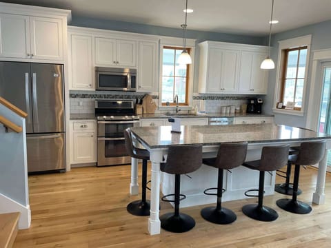 Gormet kitchen with large island and seating for 6