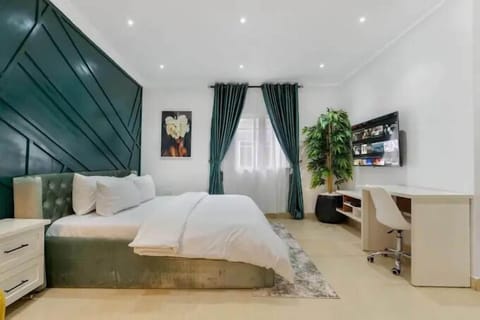 Economy Apartment, Balcony, City View | Desk, laptop workspace, blackout drapes, soundproofing