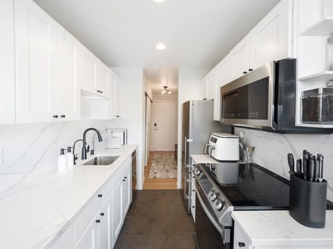 Modern kitchen with premium appliances and thoughtful finishes