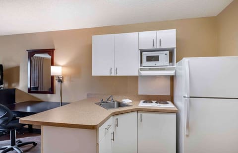 Studio, 1 Queen Bed, Non Smoking | Private kitchen | Full-size fridge, microwave, stovetop, coffee/tea maker