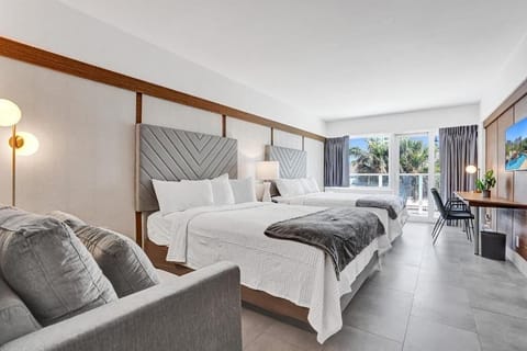 Wake up to sunshine, palms, and a breezy balcony view.