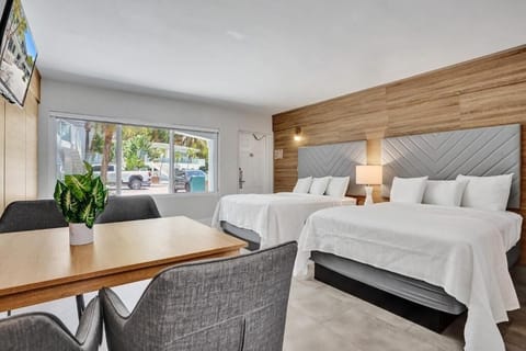 Stretch out and recharge in a bright, modern double-queen room.