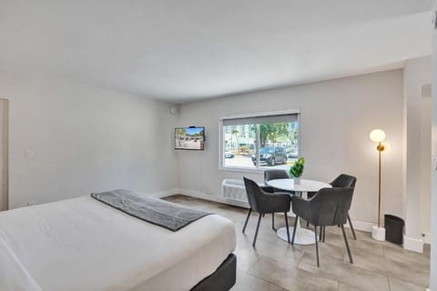 Lounge and stream favorites from bed in a bright retreat.