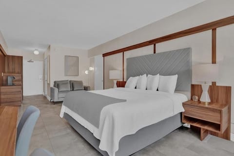 Sink into a plush king bed for deep, quiet sleep.