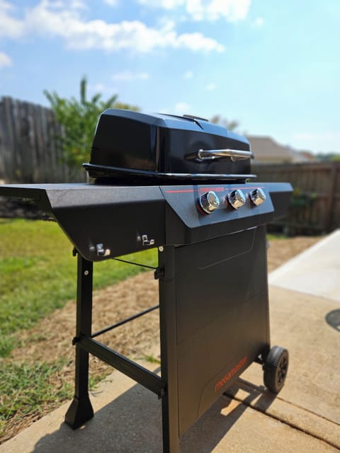 Fire up the outdoor grill and create memorable cookouts while enjoying the private backyard.