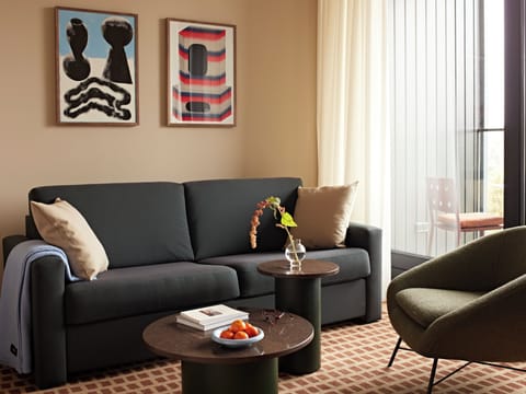 Apartment, 1 Bedroom | Living area | 40-inch Smart TV with satellite channels, streaming services