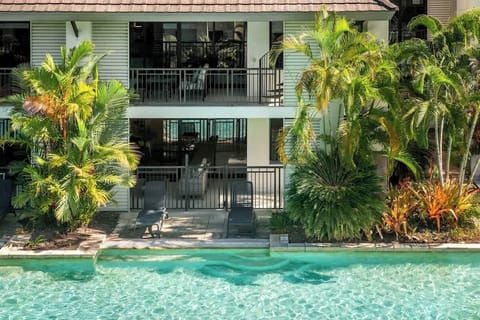 Step directly from your private patio into the crystal-clear swim-out zone, perfect for spontaneous dips and sunny mornings by the water.