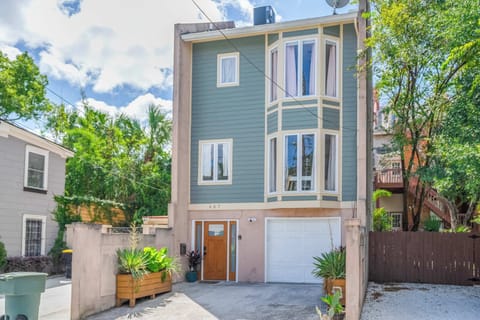 A unique and charming home exterior with the added convenience of free parking for guests!
