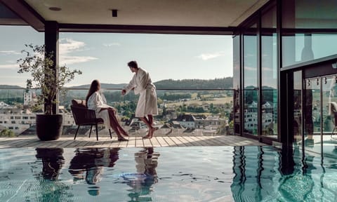 Indoor pool, outdoor pool, open 7:00 AM to 10:00 PM, pool umbrellas