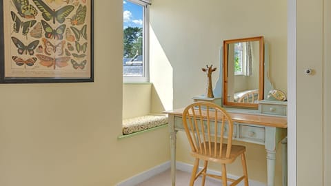 Perch on the window seat in the morning to watch the day begin before heading into Painswick for breakfast.