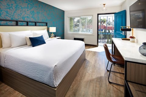 Unit with King bed. Exact unit will be assigned upon arrival. Views, colors, and decor may vary.