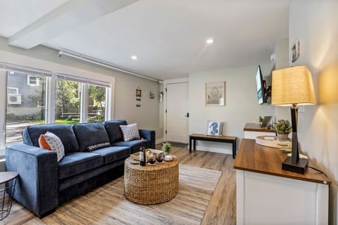 Relax and unwind in this bright, comfortable living room featuring a queen-size pullout sofa!