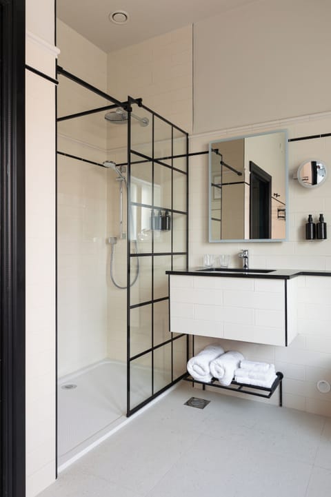 Double Room, City View | Bathroom | Designer toiletries, hair dryer, bathrobes, slippers