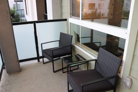 Enjoy stunning views of the iconic city from your own private balcony