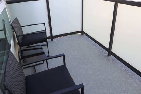 Enjoy stunning views of the iconic city from your own private balcony