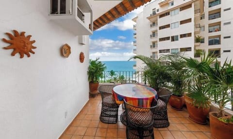 Apartment, Multiple Beds, Pool Access, Ocean View (902-VistadelSol) | Outdoor dining