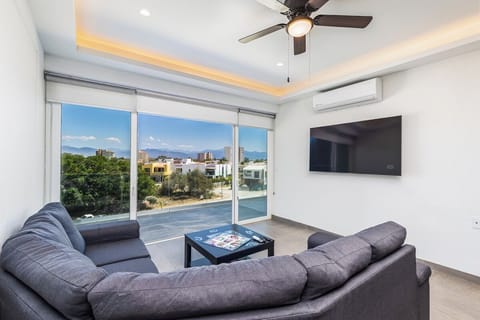 Condo, Multiple Beds, Kitchen, Pool View (Believe Condo Flamingos Believe 302) | Living area