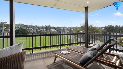 Surf n Turf - The Grandstand | Sun lounges with views of the Bonaria oval